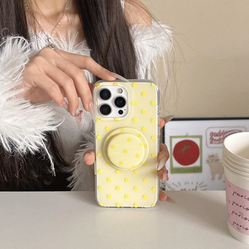 Polka dot iPhone case with magnetic bracket in black, pink, blue, and purple, compatible with iPhone models.