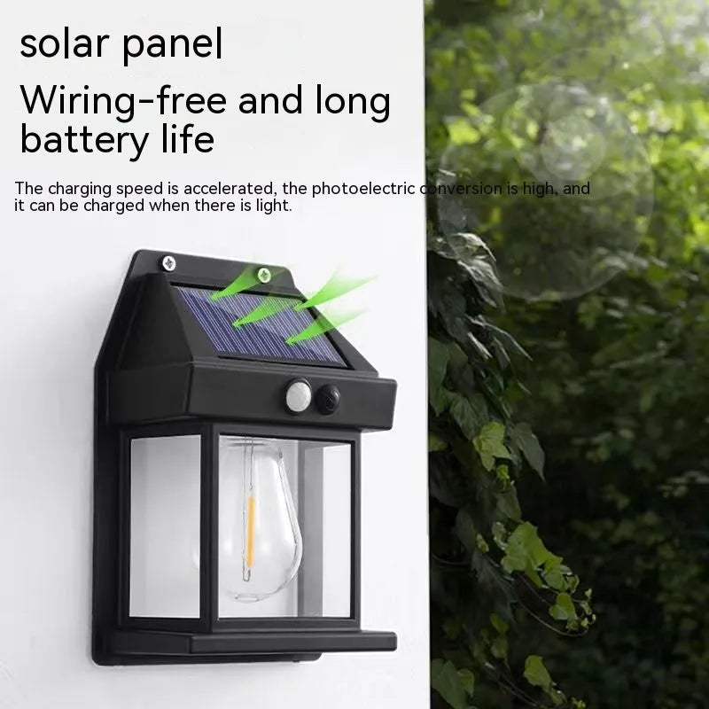 Solar tungsten wall lamp in black or white plastic with IP65 rating for outdoor garden and fence lighting