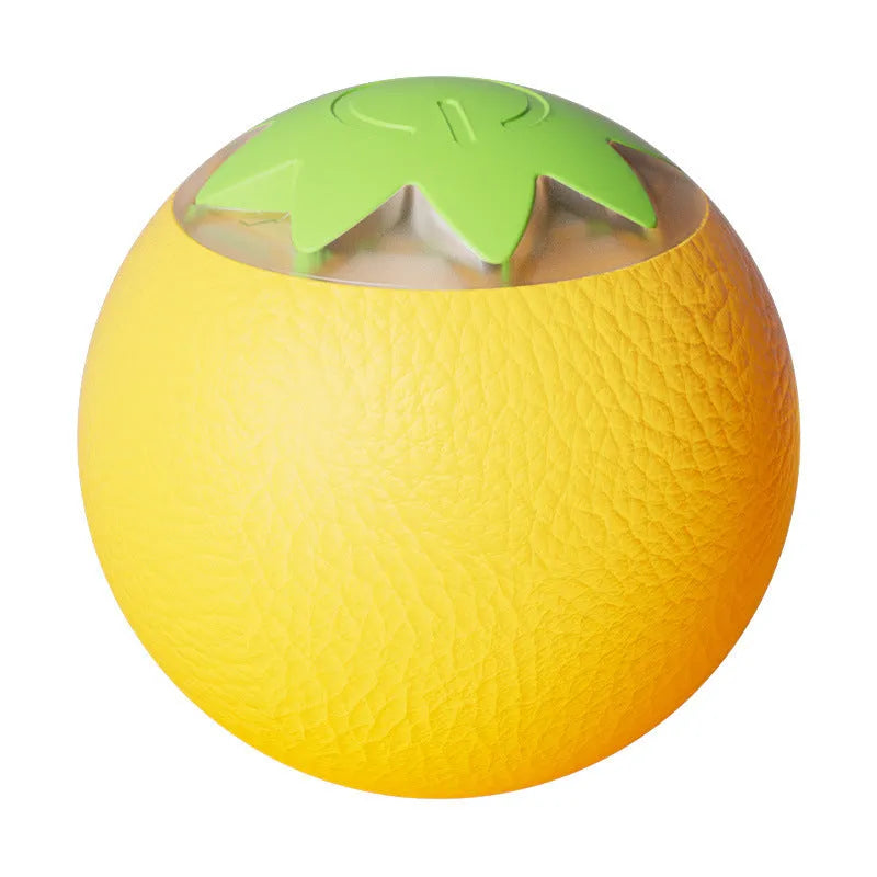 Green electric rolling ball pet toy for dogs and cats on a floor.