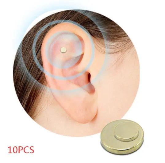 Gold quit smoking magnet earrings set with two sizes 0.5cm and 0.8cm on ear for auricular acupressure therapy