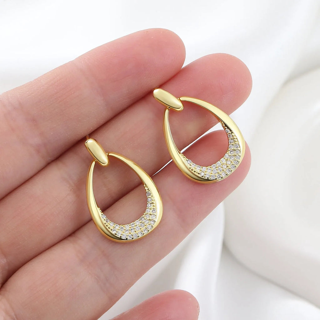 Yellow gold geometric drop earrings for women with ring design, dimensions 2.6cm by 1.7cm.