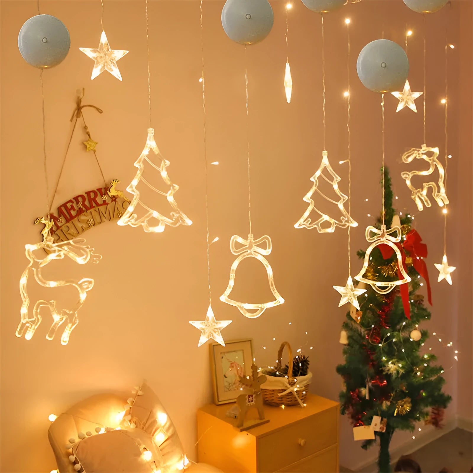 Battery-powered LED Christmas chandelier with suction cups, showing Santa Claus and snowman shapes