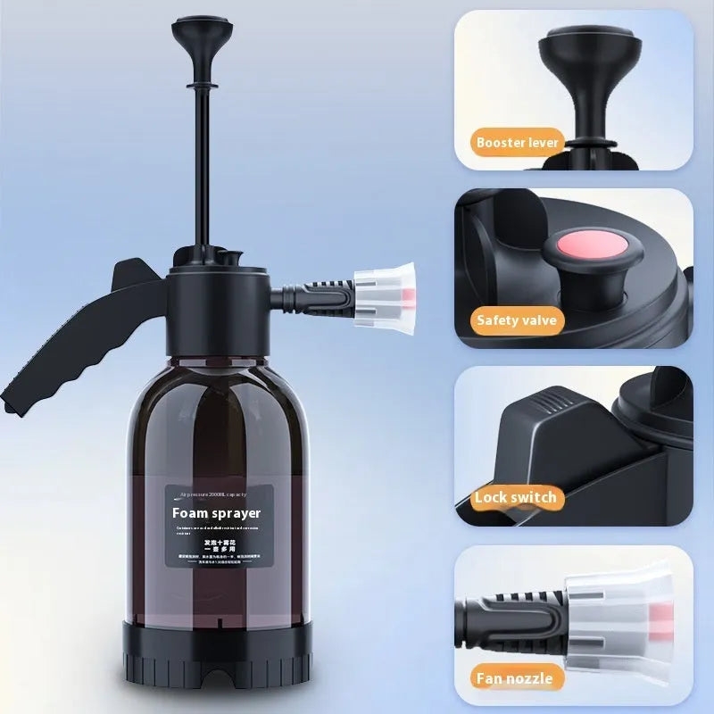 Black handheld 2L foam watering can sprayer with pump handle and two nozzles.