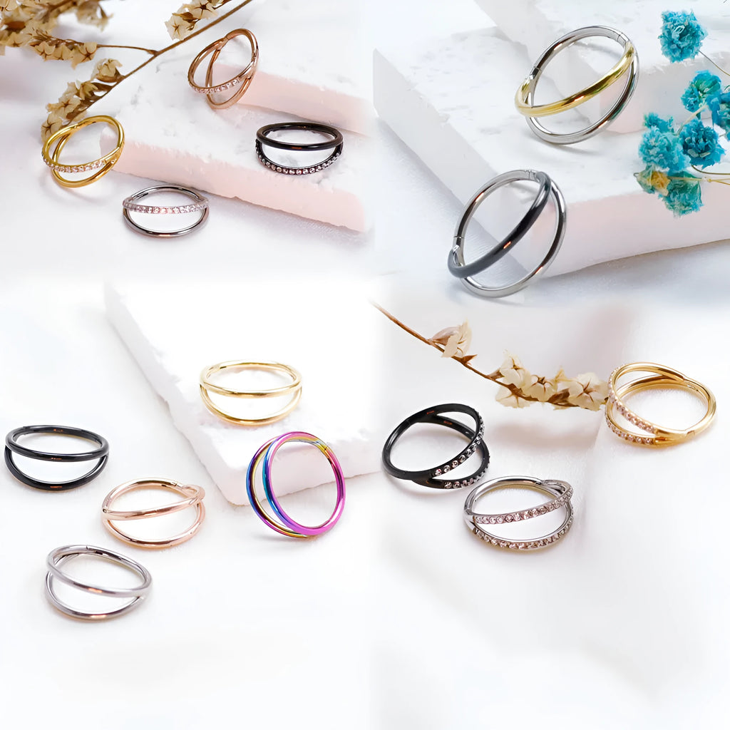 Titanium alloy nose ring body jewellery in silver colour on a plain background.
