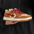 Brown women's platform sneakers with sequin detailing and lace-up front