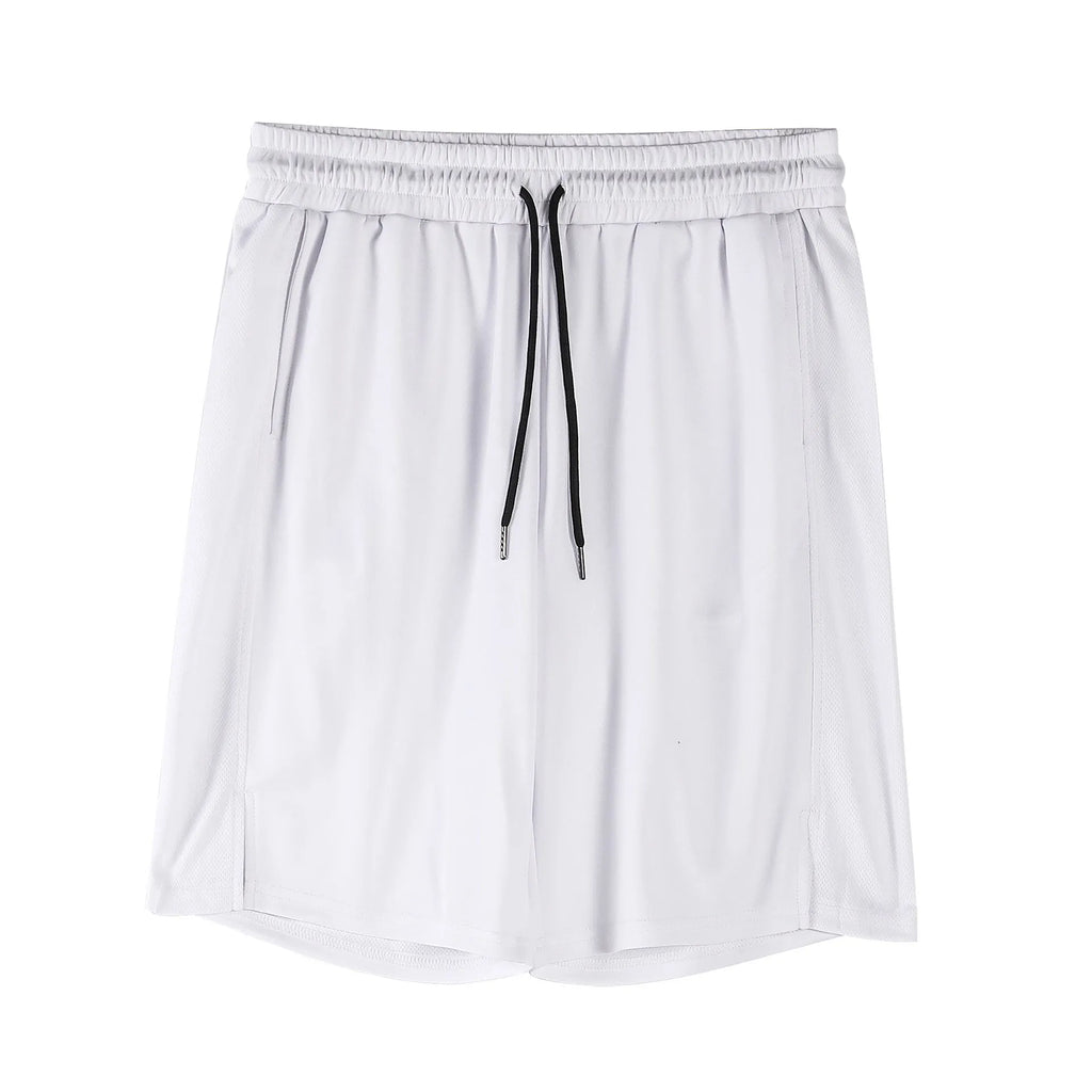 Man wearing black loose-fit quick-dry mesh shorts with an elasticated waistband.