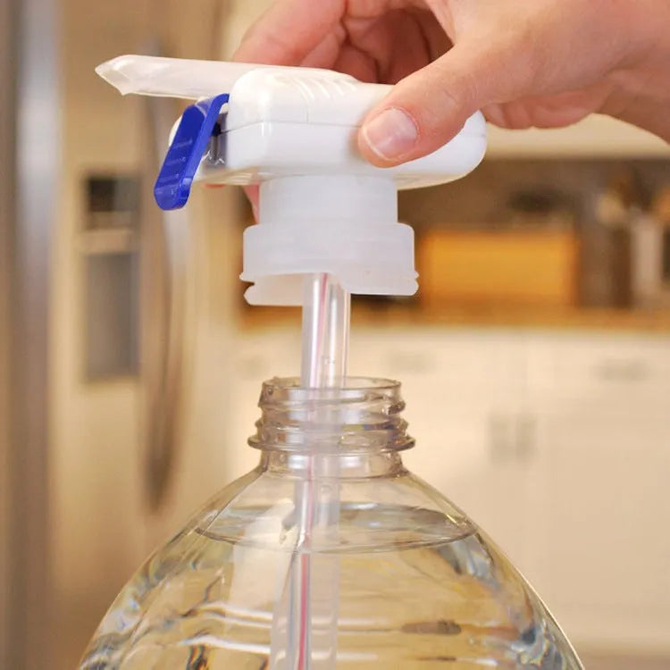 Electric beverage pump with blue silicone straws and a white press handle on a table.