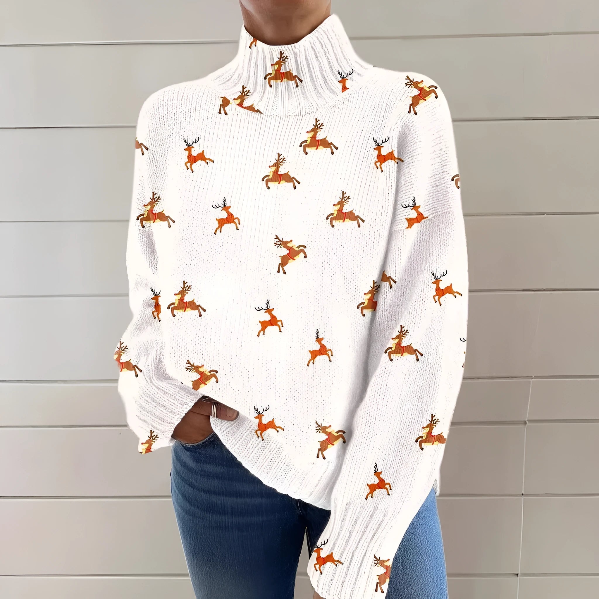 Women's printed red Christmas turtleneck loose-fit sweater on a hanger.