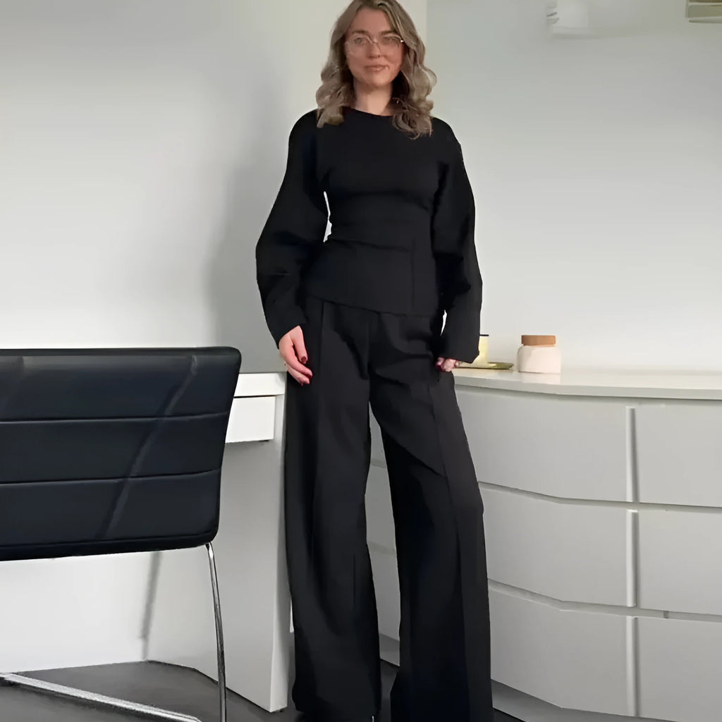 Women's long sleeve polar fleece suit set in apricot colour, showing O-neck top and wide-leg trousers.