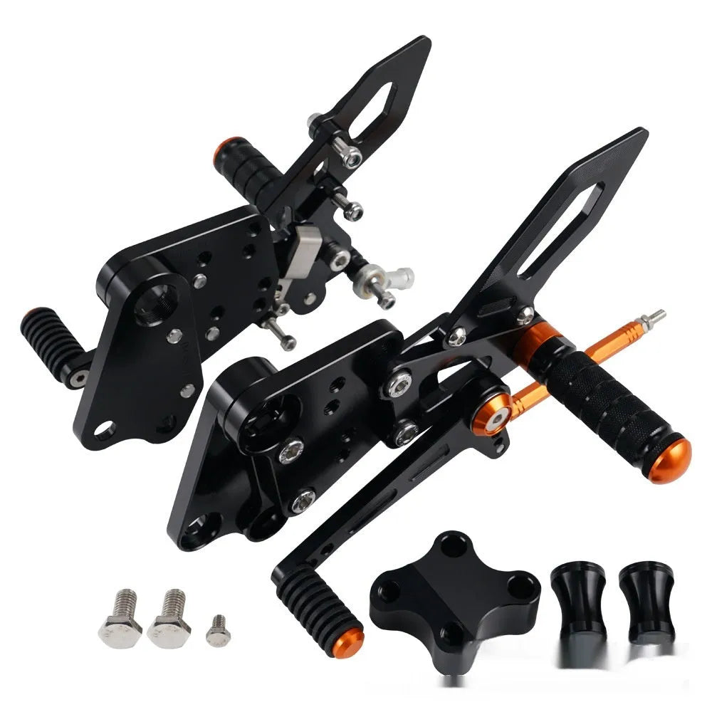 KTM Duke motorcycle pedal support assembly in black and orange for 125 200 250 390 models