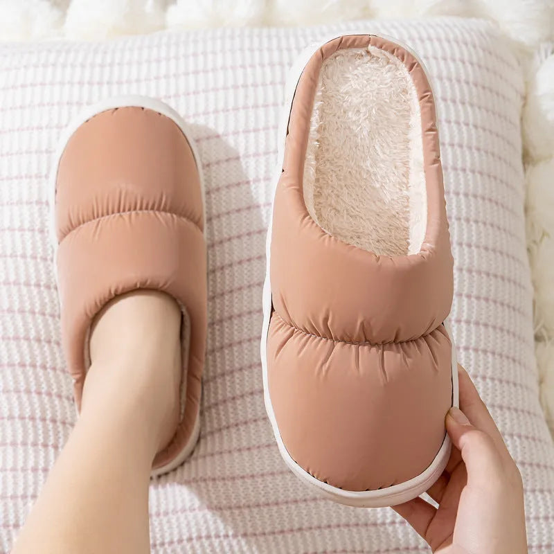 Blue down cotton slippers with artificial leather uppers, thick rubber soles, and plush lining for indoor winter wear.