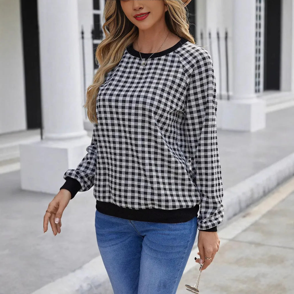 Black long sleeve women's pullover sweater with a Japanese sweet plaid and stripe print pattern.