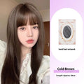 Long straight black synthetic wig with full blunt bangs on a wig stand.