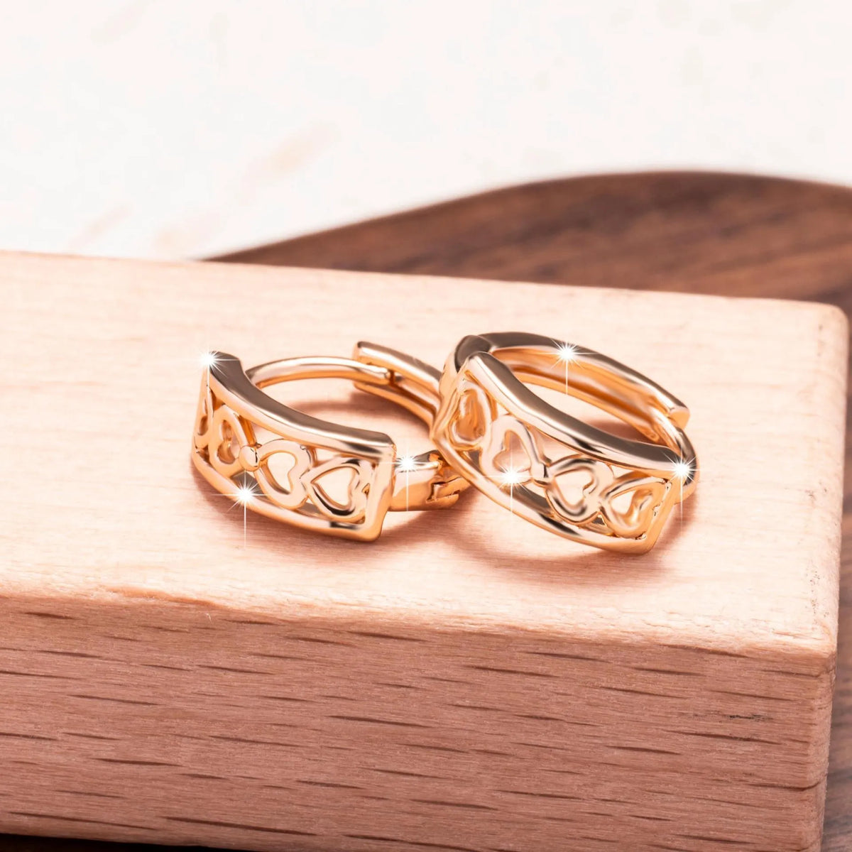 Love Glossy Hollow Ear Clip in rose gold, copper electroplated clip-on earrings, one pair, heart cut-out design
