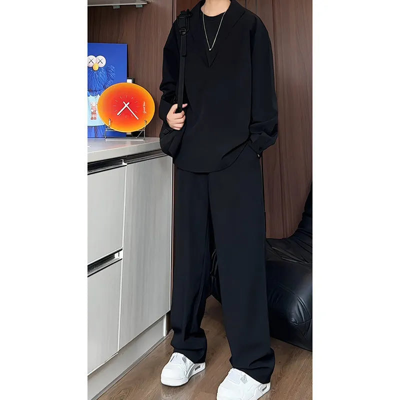 Men's black casual two-piece set with long sleeve polo shirt and matching trousers in slim fit design