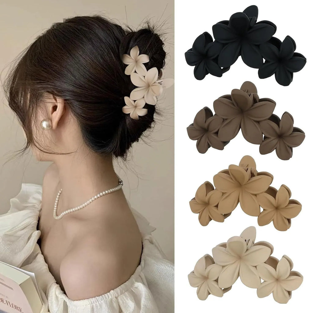 Six nude-coloured plastic hair clips with frosted grip and pointed toe design arranged on white background
