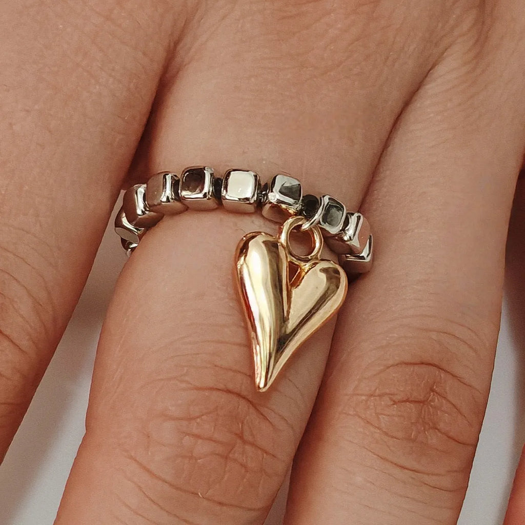 Handmade beaded elastic string love ring with geometric heart design in gold electroplated finish