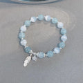 Korean style crystal bracelet with feather XINGX blue moonlight colour and eight Awn star design