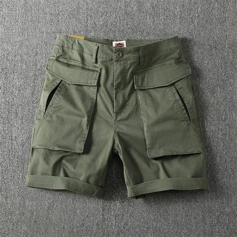 Men's cotton stretch cargo shorts in army green with multiple pockets on a white background.