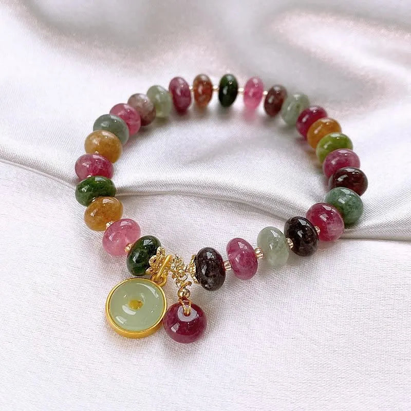 Handmade colourful tourmaline abacus bead bracelet with geometric rabbit pendant