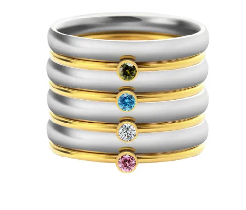 Geometric titanium steel ring with engraved December birthstone design on a white background.