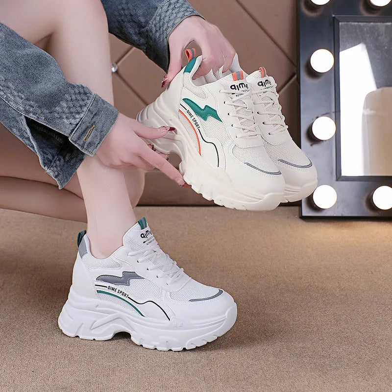 Women's white breathable height increase trainers with lace-up front and cross shoulder straps