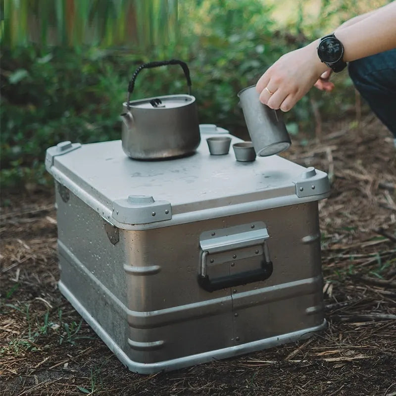 Field green aluminium alloy camping storage box with dimensions 58cm by 38cm by 28cm