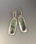 Geometric drop earrings with a two-tone marble pattern finish, made from silver-toned alloy.