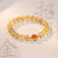 Gold rutilated quartz crystal bracelet with diamond cut stones in unisex Korean style design