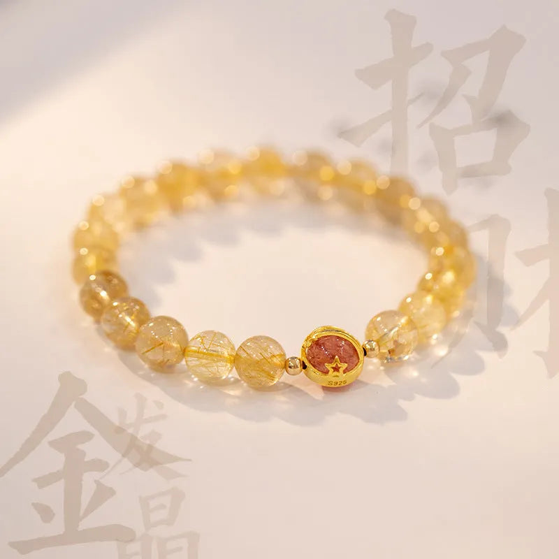 Gold rutilated quartz crystal bracelet with diamond cut stones in unisex Korean style design
