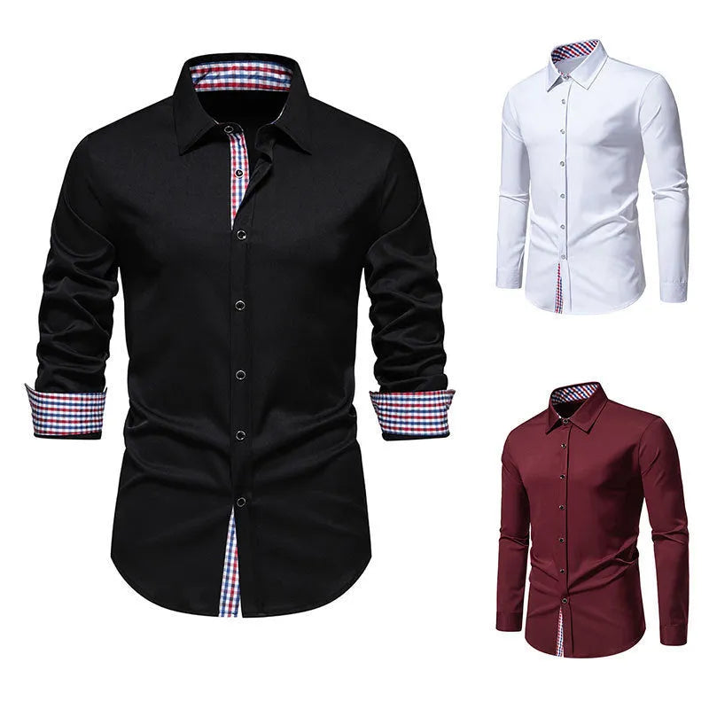 Man wearing a loose-fitting black and white plaid long-sleeved casual shirt.