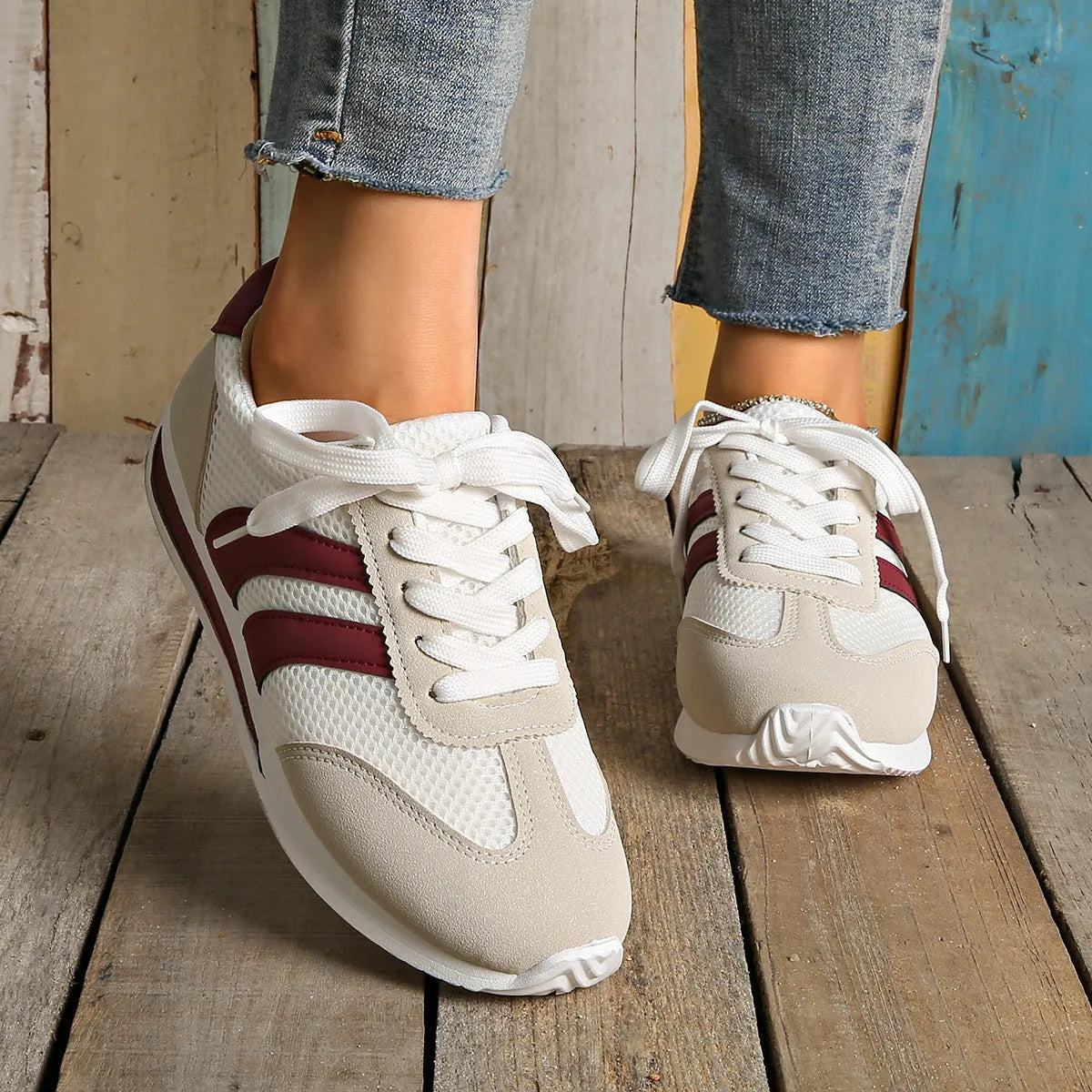 Women's wine red Cortez Retro sneakers with cross strap design and mesh lining