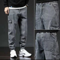 Japanese-style multi-pocket cotton workwear jeans for men in blue, black, and gray, sizes M to 5XL