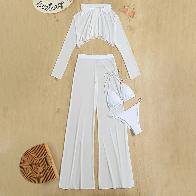White women's four-piece swimsuit set showing top, high-waist trousers, bra, and panties arranged flat