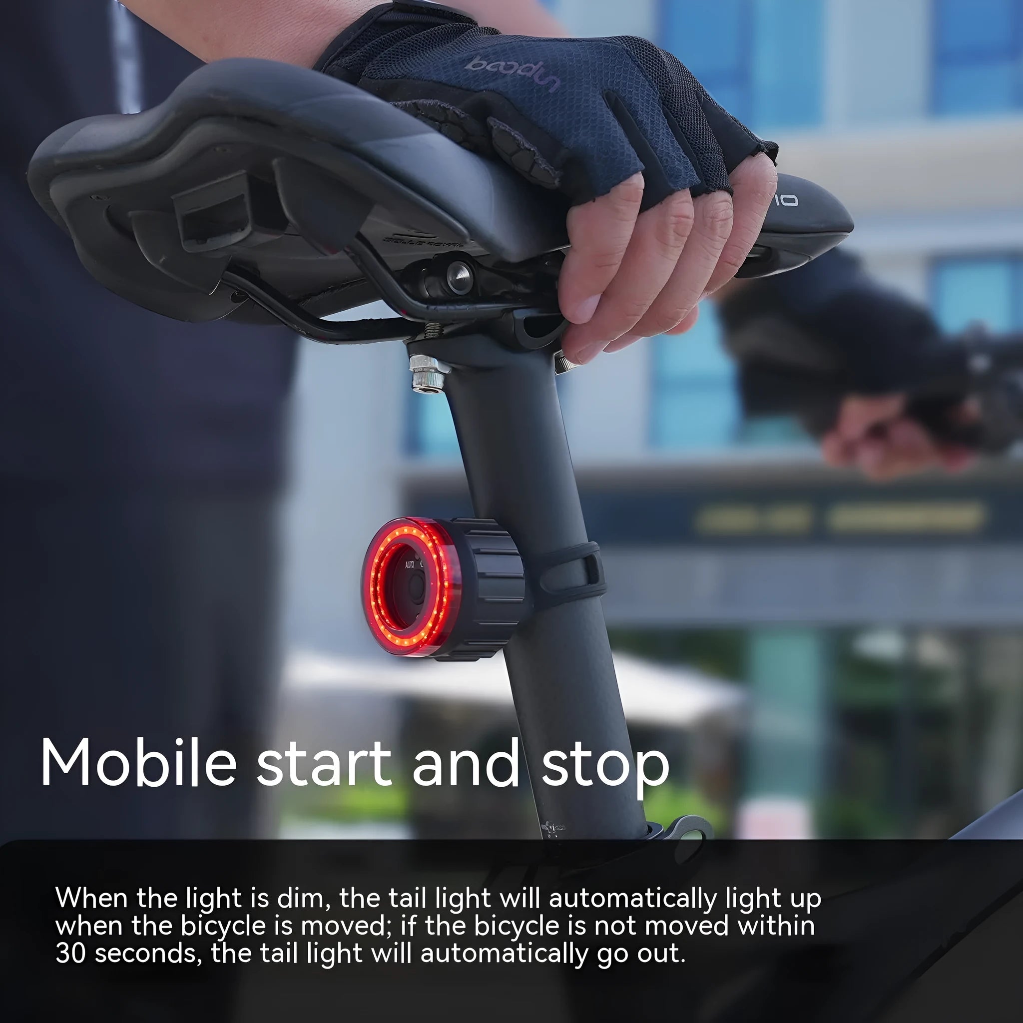 Black aluminium alloy bicycle induction brake taillight with seat tube mounting bracket.