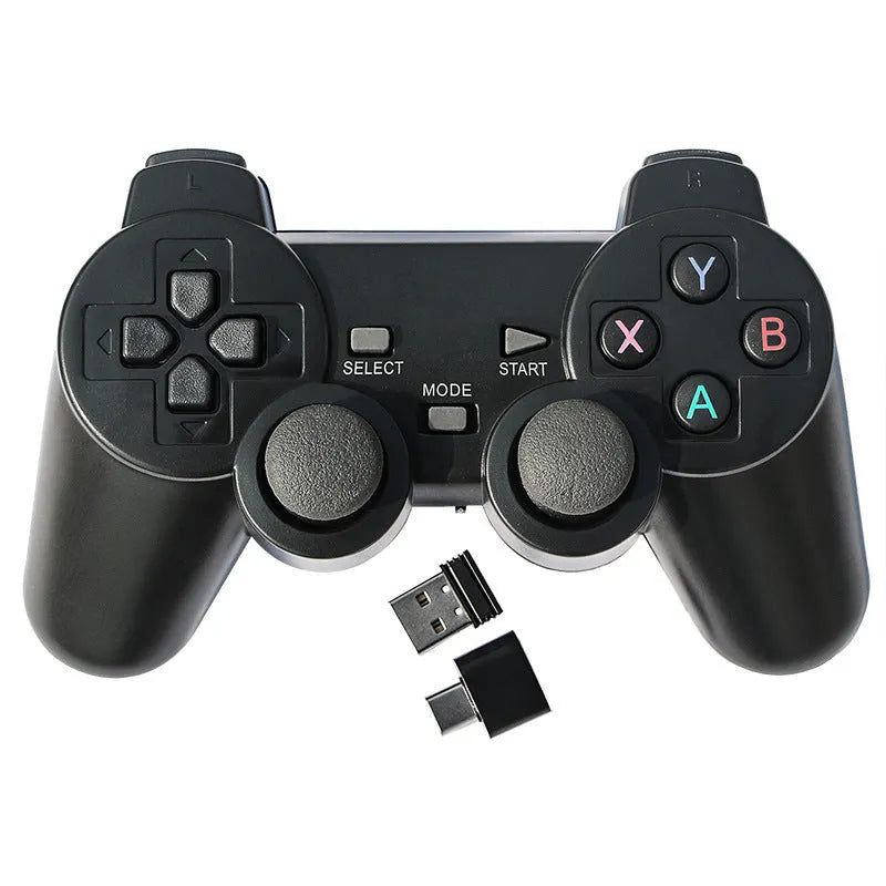Classic black wireless 2.4G gamepad with USB receiver on a dark surface.