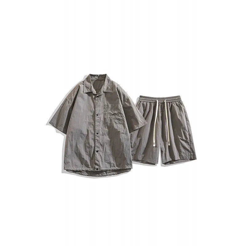 Men's dark grey loose shorts and casual shirt two-piece set made from hemp-blend fabric.