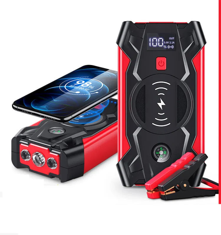 Red portable car battery jump starter power bank with digital display and jumper cables