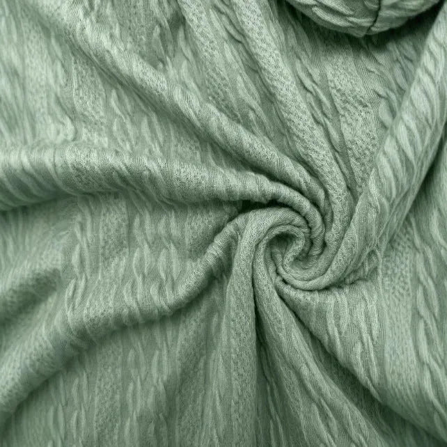 Forest green women's zip-up hooded sweater coat on a hanger, showing loose fit and long sleeves.