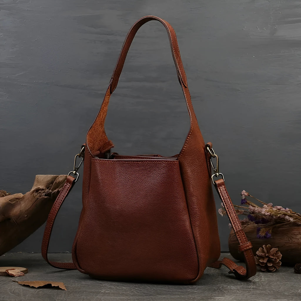 Solid colour women's cross-body bag in brown genuine first layer cowhide with sandwich pocket and single shoulder strap