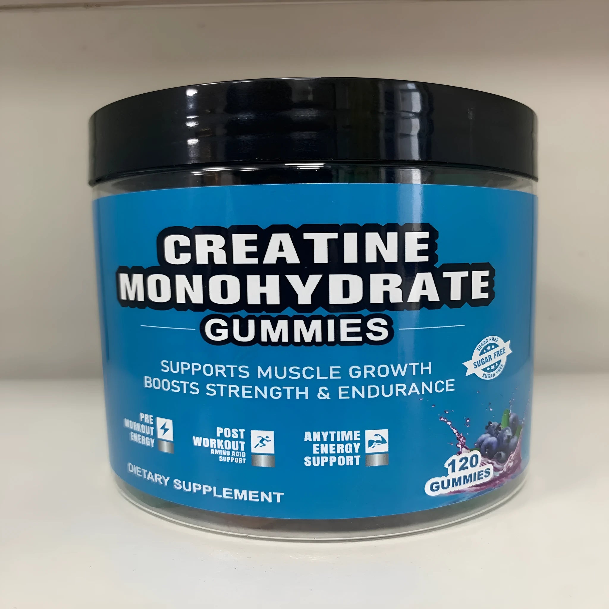 Bottle of raspberry flavoured creatine monohydrate gummies containing 120 soft candy supplements