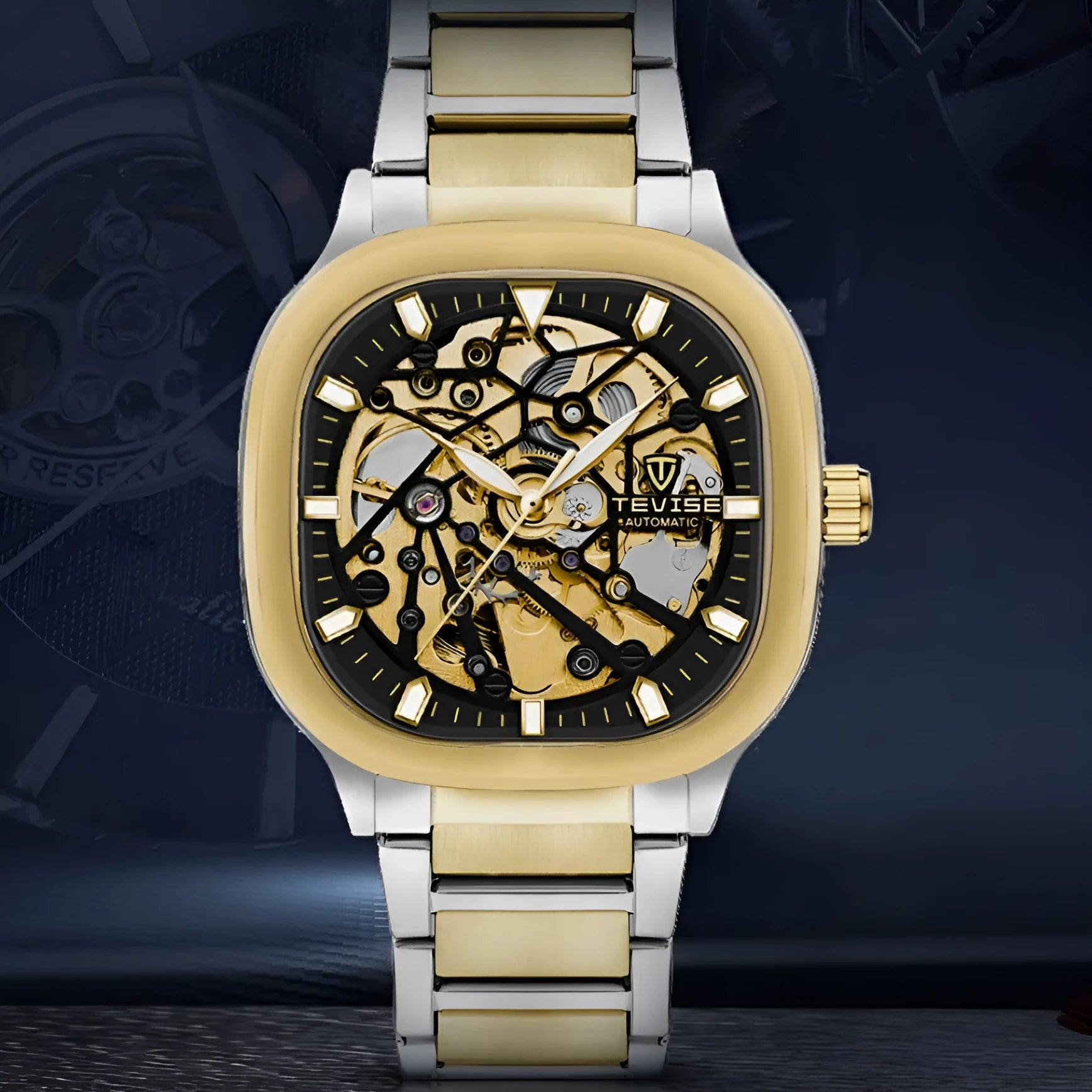 Men's square automatic watch with luminous dial on a stainless steel strap, shown in blue colour.