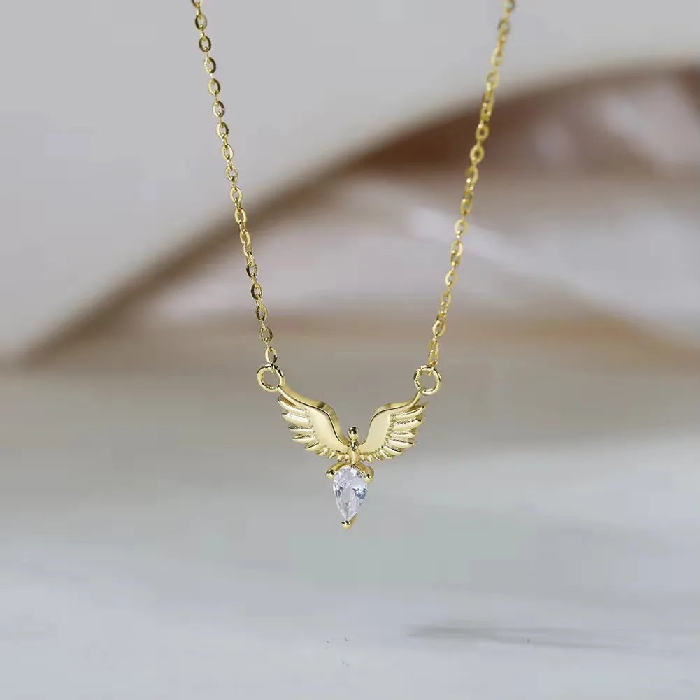 Close-up of a women's silver necklace with an eagle pendant on an adjustable O-ring chain.