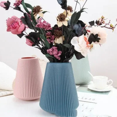 Colourful melamine plastic decorative vase measuring 16cm by 20cm in blue, green, pink and white options