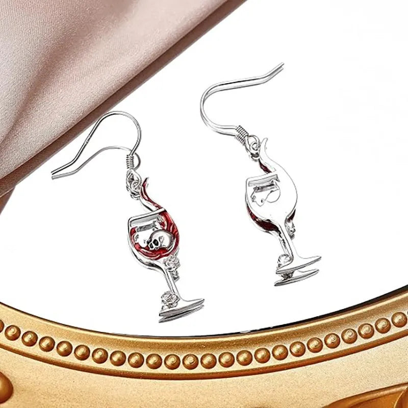 Pair of Halloween earrings featuring a skull shaped like a wine glass, made from electroplated zinc alloy.