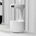 Bedroom anti-gravity humidifier with clock and backflow aroma diffuser in white plastic on desk with LED display