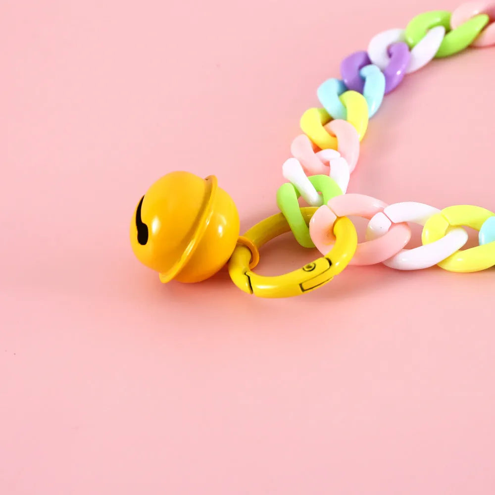 Plastic pet collar in macaron candy colours showing S and M sizes for cats, dogs, and rabbits