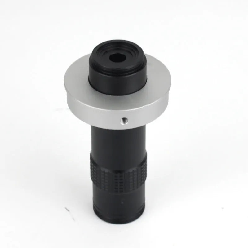Black industrial monocular camera lens for 130x magnification with 60-300mm working distance.