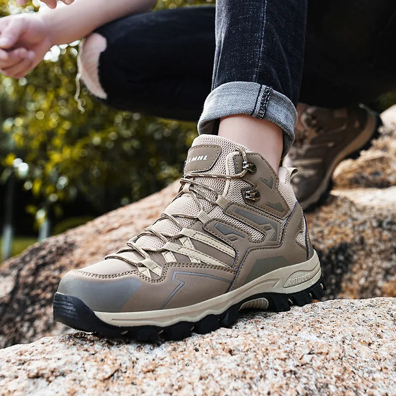 Low-top hiking sneakers in multiple colours on a rocky outdoor trail.
