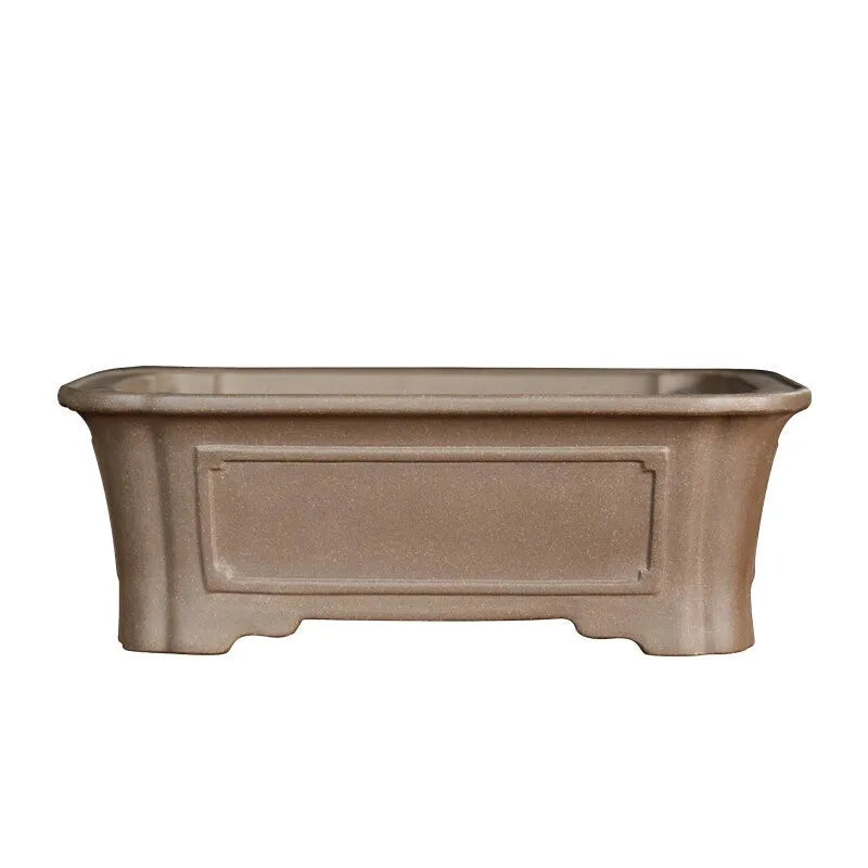 Antique rectangular purple sand clay bonsai pot on a floor, shown in two size options.